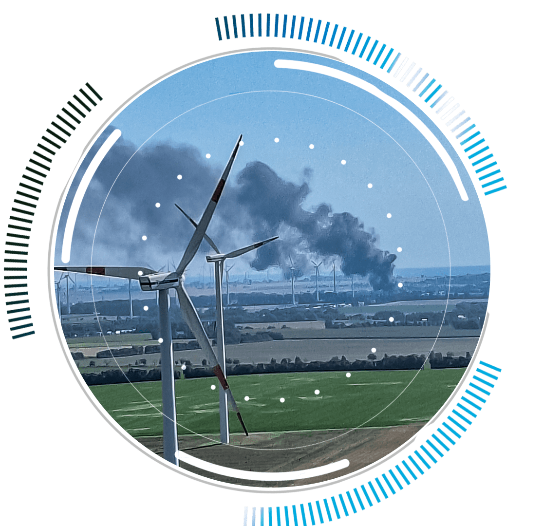 skywings.com.pl - Wind turbines stand in a field while thick black smoke rises in the distance; circular graphic elements and data-like markers overlay the image, hinting at wind turbine maintenance needs like generator bearing replacement. Wind Turbine Service & Maintenance, Windenergieanlagen-Service & Instandhaltung