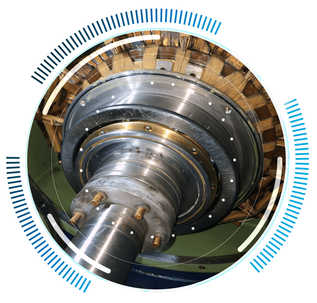 skywings.com.pl - Close-up view of a mechanical rotary component, likely part of an industrial machine, with metallic and copper elements, encircled by a digital blue and white circular graphic—illustrating advanced wind turbine electrical maintenance. Wind Turbine Service & Maintenance, Windenergieanlagen-Service & Instandhaltung