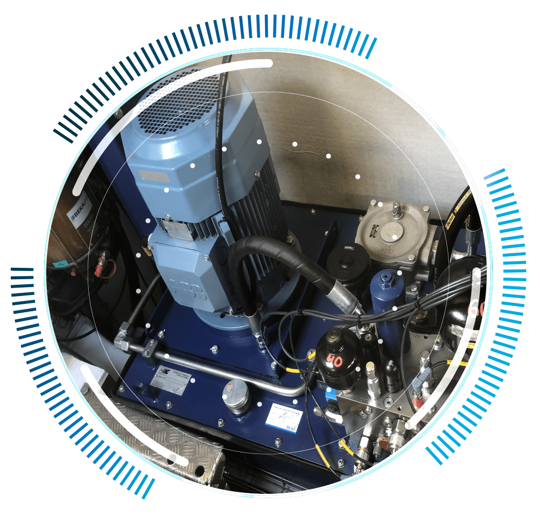 skywings.com.pl - Close-up view of industrial machinery with a blue motor, cables, pipes, and control components—surrounded by a circular graphic interface—depicting advanced wind turbine electrical maintenance solutions. Wind Turbine Service & Maintenance, Windenergieanlagen-Service & Instandhaltung