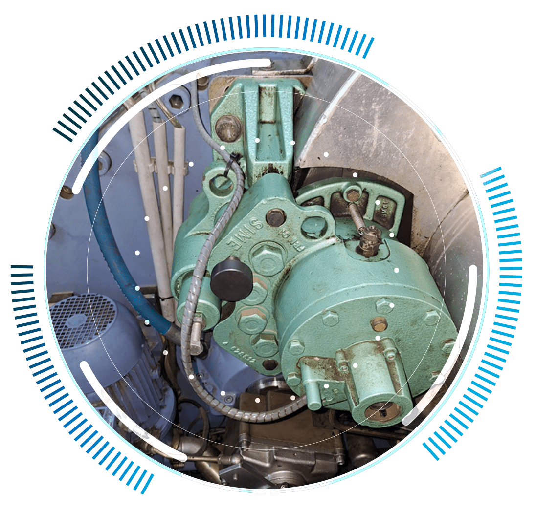 skywings.com.pl - Close-up of a green industrial machine component, possibly part of a wind turbine gearbox repair, with pipes and bolts, surrounded by a circular blue and white digital graphic overlay. Background features more machinery parts and cables. Wind Turbine Service & Maintenance, Windenergieanlagen-Service & Instandhaltung