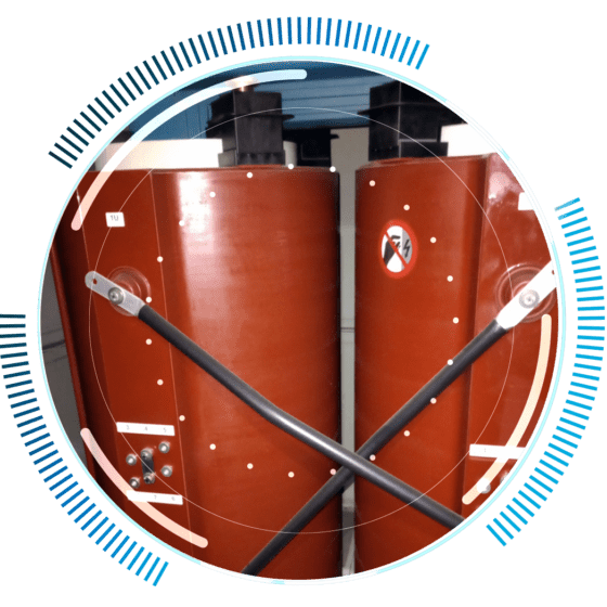 skywings.com.pl - Two large, cylindrical red electrical components are shown close together with warning signs and black support rods in front, surrounded by a circular graphic with blue lines—ideal for illustrating Windpark-Wartung or wind farm technical service. Wind Turbine Service & Maintenance, Windenergieanlagen-Service & Instandhaltung